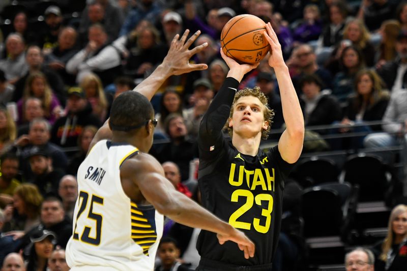 SALT LAKE CITY, UTAH - JANUARY 15: Lauri Markkanen #23 of the Utah Jazz shoots against Jalen Smith #25 of the Indiana Pacers during the first half of a game at Delta Center on January 15, 2024 in Salt Lake City, Utah. NOTE TO USER: User expressly acknowledges and agrees that, by downloading and or using this photograph, User is consenting to the terms and conditions of the Getty Images License Agreement. (Photo by Alex Goodlett/Getty Images)