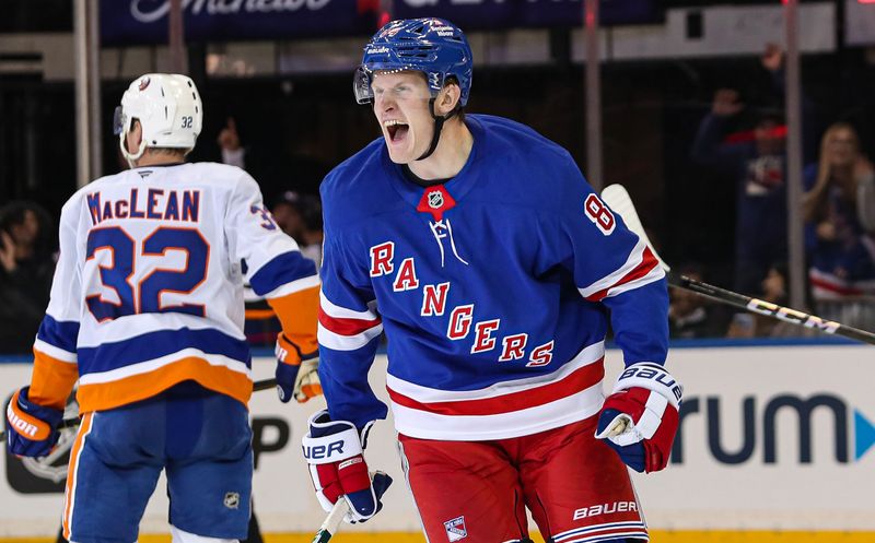 Sep 24, 2024; New York, New York, USA; New York Rangers center Adam Edstrom (84) celebrates his game-winning goal against the New York Islanders during the third period at Madison Square Garden. Mandatory Credit: Danny Wild-Imagn Images