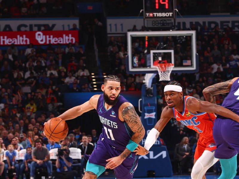 OKLAHOMA CITY, OK - FEBUARY 2:  Cody Martin #11 of the Charlotte Hornets goes to the basket during the game on February 2, 2024 at Paycom Arena in Oklahoma City, Oklahoma. NOTE TO USER: User expressly acknowledges and agrees that, by downloading and or using this photograph, User is consenting to the terms and conditions of the Getty Images License Agreement. Mandatory Copyright Notice: Copyright 2024 NBAE (Photo by Zach Beeker/NBAE via Getty Images)