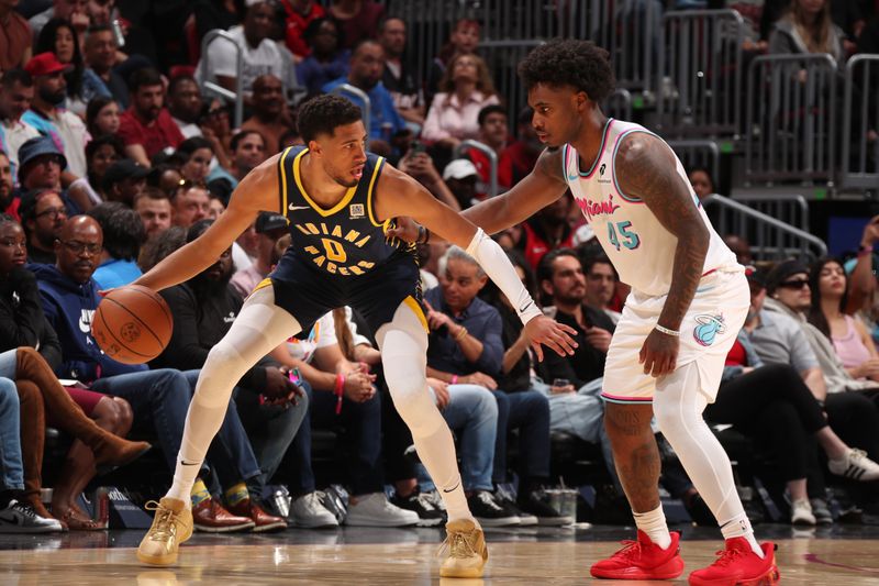 MIAMI, FL - FEBRUARY 28:  Tyrese Haliburton #0 of the Indiana Pacers dribbles the ball during the game against the Miami Heat on February 28, 2025 at Kaseya Center in Miami, Florida. NOTE TO USER: User expressly acknowledges and agrees that, by downloading and or using this Photograph, user is consenting to the terms and conditions of the Getty Images License Agreement. Mandatory Copyright Notice: Copyright 2025 NBAE (Photo by Issac Baldizon/NBAE via Getty Images)