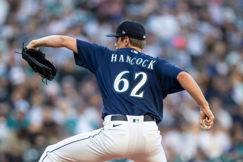 Aug 9, 2023; Seattle, Washington, USA; Seattle Mariners starter Emerson Hancock (62) delivers a pitch during the third inning against the San Diego Padres at T-Mobile Park. Mandatory Credit: Stephen Brashear-USA TODAY Sports
