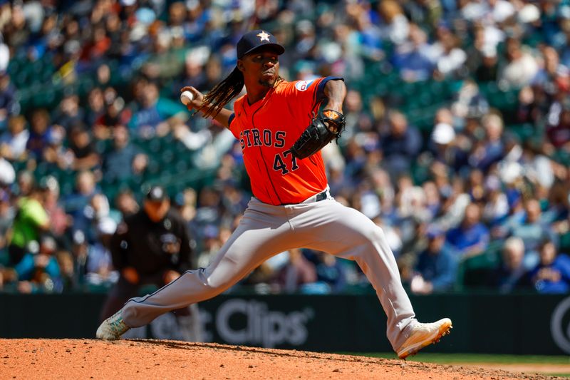 May 30, 2024; Seattle, Washington, USA; Houston Astros relief pitcher Rafael Montero (47) throws against the Seattle Mariners during the seventh inning at T-Mobile Park. Mandatory Credit: Joe Nicholson-USA TODAY Sports