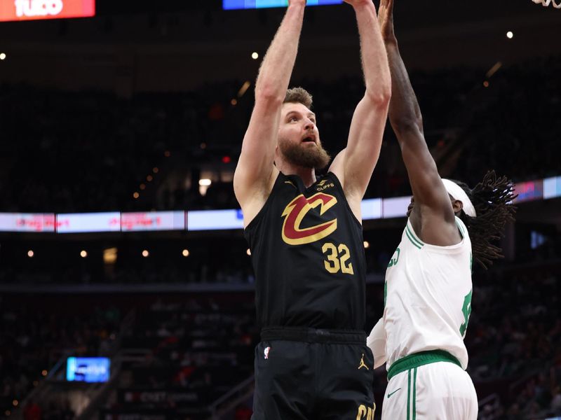 CLEVELAND, OH - MARCH 5: Dean Wade #32 of the Cleveland Cavaliers drives to the basket during the game against the Boston Celtics on March 5, 2024 at Rocket Mortgage FieldHouse in Cleveland, Ohio. NOTE TO USER: User expressly acknowledges and agrees that, by downloading and/or using this Photograph, user is consenting to the terms and conditions of the Getty Images License Agreement. Mandatory Copyright Notice: Copyright 2024 NBAE (Photo by Lauren Leigh Bacho<p><br/></p>/NBAE via Getty Images)