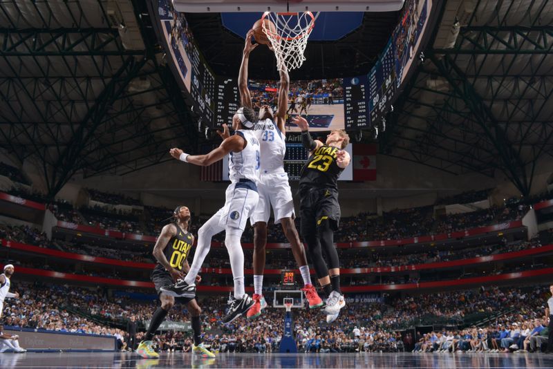 DALLAS, TX - OCTOBER 10: Jamarion Sharp #33 of the Dallas Mavericks attempts a dunk on October 10, 2024 at American Airlines Center in Dallas, Texas. NOTE TO USER: User expressly acknowledges and agrees that, by downloading and or using this photograph, User is consenting to the terms and conditions of the Getty Images License Agreement. Mandatory Copyright Notice: Copyright 2024 NBAE (Photo by Glenn James/NBAE via Getty Images)