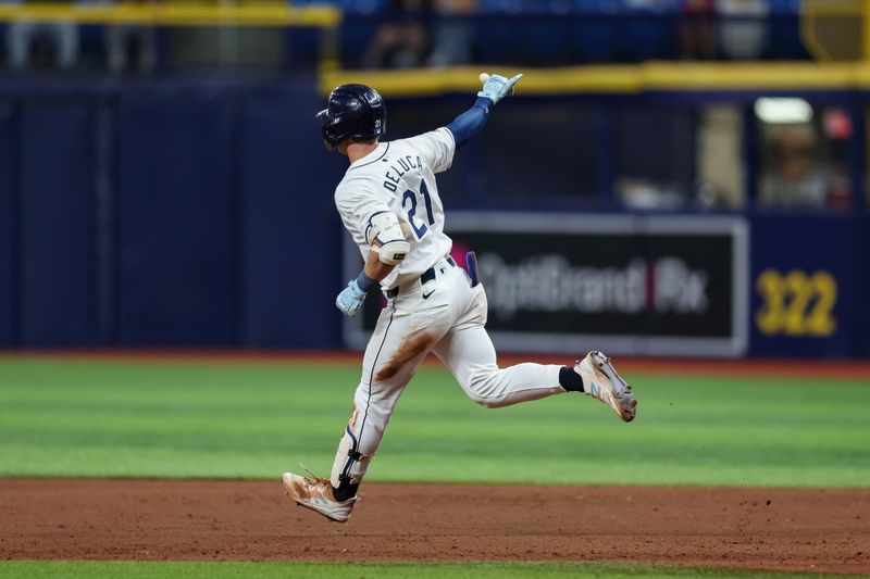 Sep 2, 2024; St. Petersburg, Florida, USA; Tampa Bay Rays outfielder Jonny DeLuca (21) runs the bases after hitting a home run against the Minnesota Twins in the eighth inning at Tropicana Field. Mandatory Credit: Nathan Ray Seebeck-USA TODAY Sports