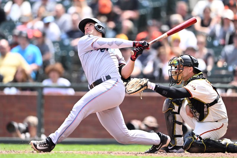 May 21, 2023; San Francisco, California, USA; Miami Marlins catcher Nick Fortes (4) bats against the San Francisco Giants during the sixth inning at Oracle Park. Mandatory Credit: Robert Edwards-USA TODAY Sports