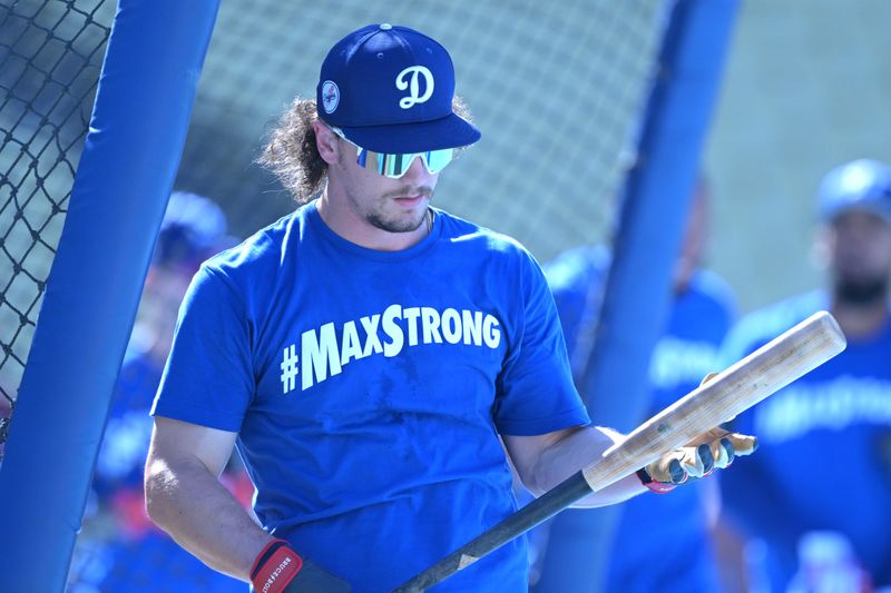 Aug 5, 2024; Los Angeles, California, USA;  Los Angeles Dodgers center fielder James Outman (33) during batting practice prior to the game against the Philadelphia Phillies at Dodger Stadium. Dodger players wore #MaxStrong shirts during pregame to honor Max, the 3-year old son of first baseman Freddie Freeman (5), who was diagnosed with Guillian-Barre syndrome. Mandatory Credit: Jayne Kamin-Oncea-USA TODAY Sports