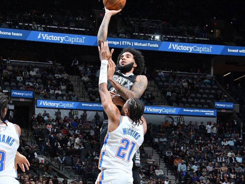 SAN ANTONIO, TX - NOVEMBER 19:  Julian Champagnie #30 of the San Antonio Spurs drives to the basket during the game against the Oklahoma City Thunder during the Emirates NBA Cup game on November 19, 2024 at the Frost Bank Center in San Antonio, Texas. NOTE TO USER: User expressly acknowledges and agrees that, by downloading and or using this photograph, user is consenting to the terms and conditions of the Getty Images License Agreement. Mandatory Copyright Notice: Copyright 2024 NBAE (Photos by Michael Gonzales/NBAE via Getty Images)