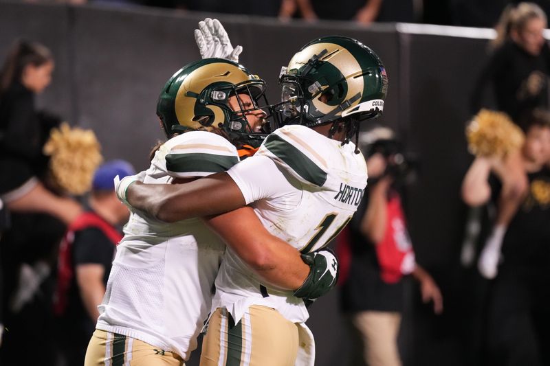 Sep 16, 2023; Boulder, Colorado, USA; Colorado State Rams tight end Dallin Holker (5) celebrates with wide receiver Tory Horton (14) after a touchdown against the Colorado Buffaloes during the fourth quarter at Folsom Field. Mandatory Credit: Andrew Wevers-USA TODAY Sports