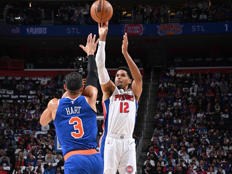DETROIT, MI - APRIL 27: Tobias Harris #12 of the Detroit Pistons three point basket during the game against the New York Knicks during Round 1 Game 4 of the 2025 NBA Playoffs on April 27, 2025 at Little Caesars Arena in Detroit, Michigan. NOTE TO USER: User expressly acknowledges and agrees that, by downloading and/or using this photograph, User is consenting to the terms and conditions of the Getty Images License Agreement. Mandatory Copyright Notice: Copyright 2025 NBAE(Photo by Chris Schwegler/NBAE via Getty Images)