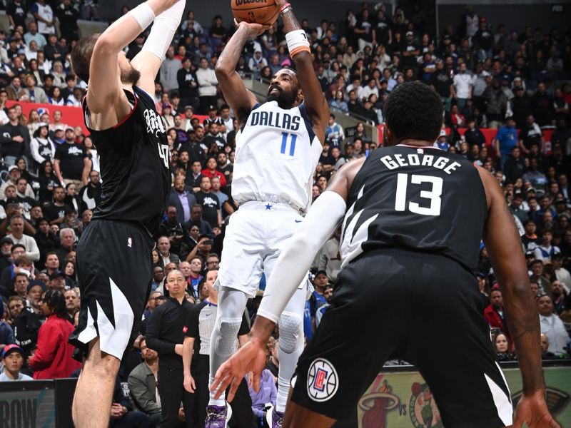 LOS ANGELES, CA - APRIL 23: Kyrie Irving #11 of the Dallas Mavericks shoots the ball during the game against the LA Clippers during Round 1 Game 2 of the 2024 NBA Playoffs on April 23, 2024 at Crypto.Com Arena in Los Angeles, California. NOTE TO USER: User expressly acknowledges and agrees that, by downloading and/or using this Photograph, user is consenting to the terms and conditions of the Getty Images License Agreement. Mandatory Copyright Notice: Copyright 2024 NBAE (Photo by Andrew D. Bernstein/NBAE via Getty Images)