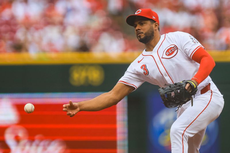 Jun 23, 2024; Cincinnati, Ohio, USA; Cincinnati Reds first baseman Jeimer Candelario (3) throws to first to get Boston Red Sox outfielder Jarren Duran (not pictured) out in the first inning at Great American Ball Park. Mandatory Credit: Katie Stratman-USA TODAY Sports