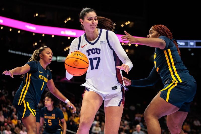 Mar 8, 2026; Kansas City, MO, USA; TCU Horned Frogs center Clara Silva (17) drives to the basket during the second half against the West Virginia Mountaineers at T-Mobile Center. Mandatory Credit: William Purnell-Imagn Images