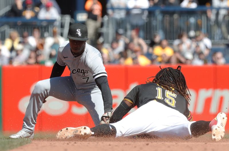 Apr 9, 2023; Pittsburgh, Pennsylvania, USA;  Pittsburgh Pirates shortstop Oneil Cruz (15) steals second base as Chicago White Sox shortstop Tim Anderson (7) applies a late tag during the sixth inning at PNC Park. Mandatory Credit: Charles LeClaire-USA TODAY Sports