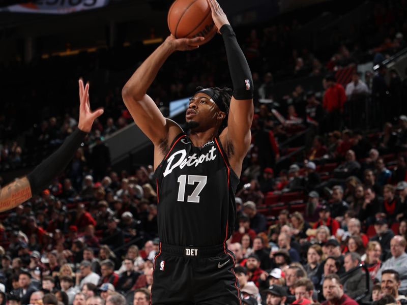 PORTLAND, OR - FEBRUARY 8: Stanley Umude #17 of the Detroit Pistons shoots a three point basket during the game against the Portland Trail Blazers on February 8, 2024 at the Moda Center Arena in Portland, Oregon. NOTE TO USER: User expressly acknowledges and agrees that, by downloading and or using this photograph, user is consenting to the terms and conditions of the Getty Images License Agreement. Mandatory Copyright Notice: Copyright 2024 NBAE (Photo by Cameron Browne/NBAE via Getty Images)