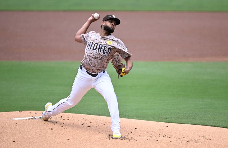 Jul 14, 2024; San Diego, California, USA; San Diego Padres starting pitcher Randy Vasquez (98) pitches against the Atlanta Braves during the first inning at Petco Park. Mandatory Credit: Orlando Ramirez-USA TODAY Sports