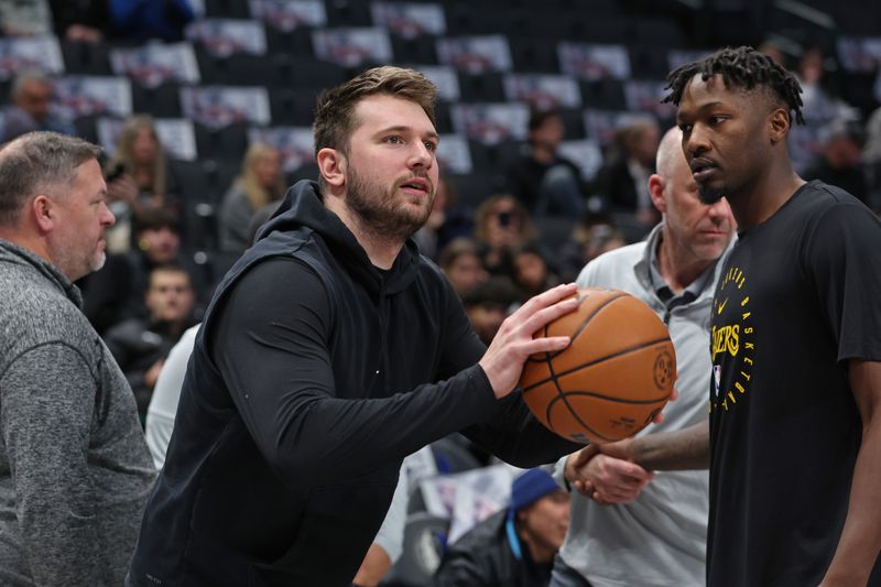 DALLAS, TX - JANUARY 7: Luka Doncic #77 of the Dallas Mavericks warms up before the game against the Los Angeles Lakers on January 7, 2025 at American Airlines Center in Dallas, Texas. NOTE TO USER: User expressly acknowledges and agrees that, by downloading and or using this photograph, User is consenting to the terms and conditions of the Getty Images License Agreement. Mandatory Copyright Notice: Copyright 2025 NBAE (Photo by Tim Heitman/NBAE via Getty Images)