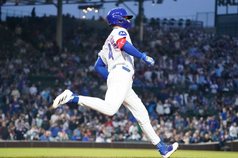 May 28, 2025; Chicago, Illinois, USA; Chicago Cubs outfielder Pete Crow-Armstrong (4) runs the bases after hitting a home run against the Colorado Rockies during the fourth inning at Wrigley Field. Mandatory Credit: David Banks-Imagn Images
