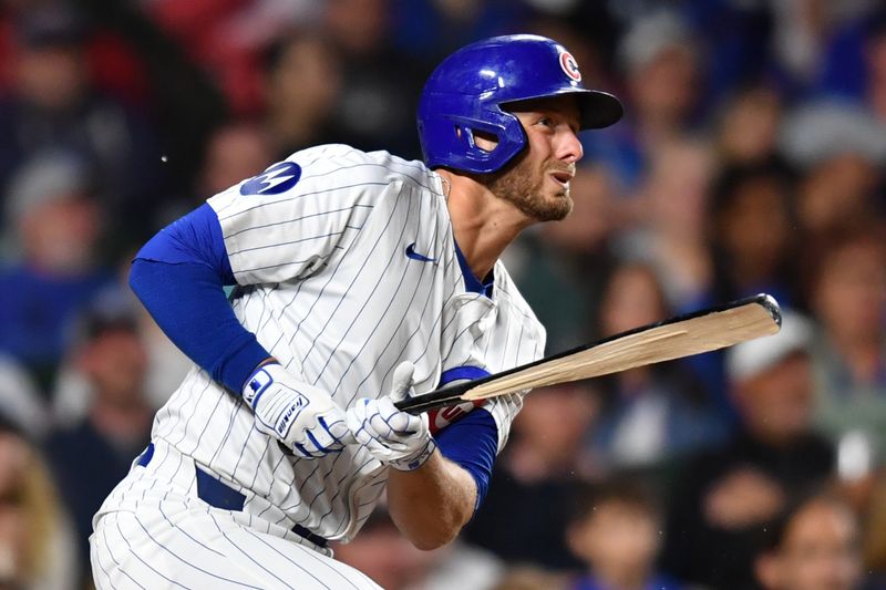 Aug 20, 2024; Chicago, Illinois, USA; Chicago Cubs first base Michael Busch (29) grounds out while breaking his bat during the seventh inning against the Detroit Tigers at Wrigley Field. Mandatory Credit: Patrick Gorski-USA TODAY Sports