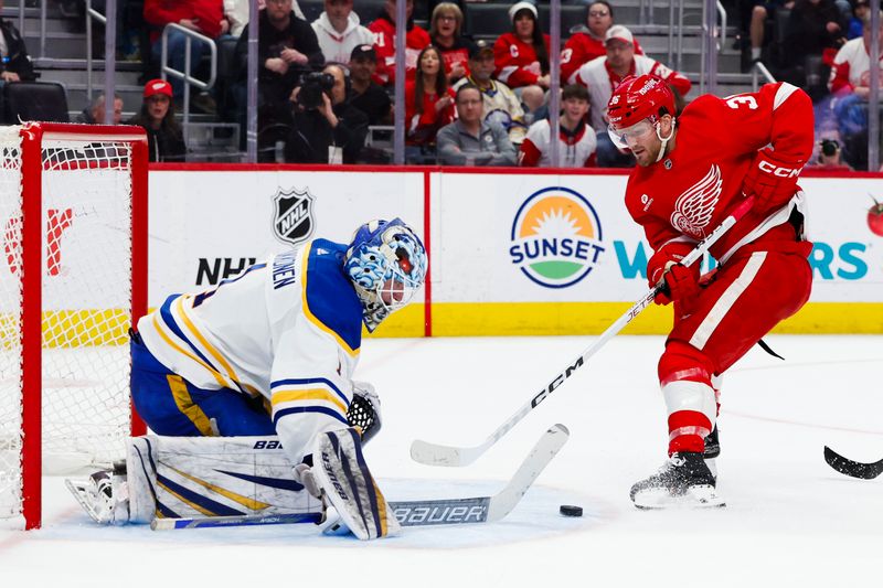 Mar 16, 2024; Detroit, Michigan, USA;  Buffalo Sabres goaltender Ukko-Pekka Luukkonen (1) makes a save on Detroit Red Wings right wing Christian Fischer (36) in the second period at Little Caesars Arena. Mandatory Credit: Rick Osentoski-USA TODAY Sports