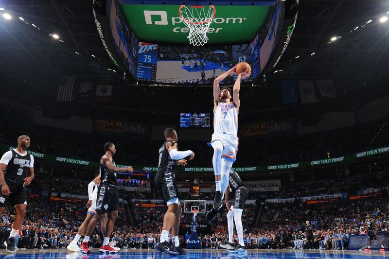 OKLAHOMA CITY, OK - OCTOBER 30: Chet Holmgren #7 of the Oklahoma City Thunder drives to the basket during the game against the San Antonio Spurs on October 30, 2024 at Paycom Center in Oklahoma City, Oklahoma. NOTE TO USER: User expressly acknowledges and agrees that, by downloading and or using this photograph, User is consenting to the terms and conditions of the Getty Images License Agreement. Mandatory Copyright Notice: Copyright 2024 NBAE (Photo by Brian Babineau/NBAE via Getty Images)