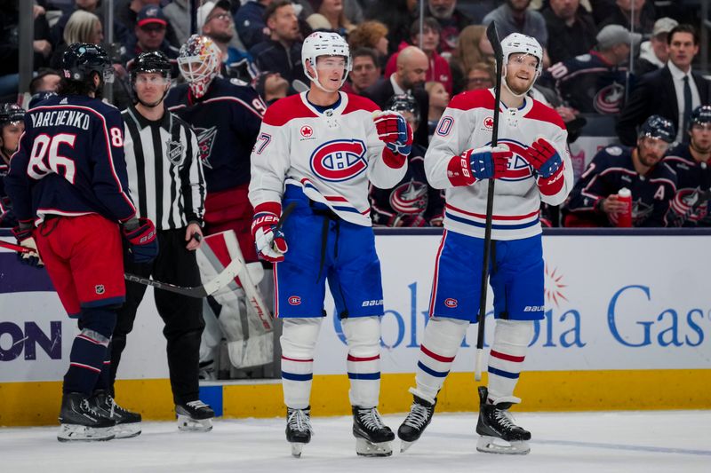 Nov 29, 2023; Columbus, Ohio, USA;  Montreal Canadiens defenseman Gustav Lindstrom (27) celebrates scoring a goal against the Columbus Blue Jackets in the third period at Nationwide Arena. Mandatory Credit: Aaron Doster-USA TODAY Sports