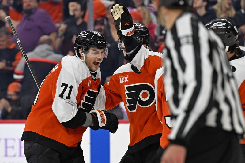Nov 20, 2025; Philadelphia, Pennsylvania, USA; Philadelphia Flyers right wing Tyson Foerster (71) celebrates his goal with teammates against the St. Louis Blues during the third period at Xfinity Mobile Arena. Mandatory Credit: Eric Hartline-Imagn Images