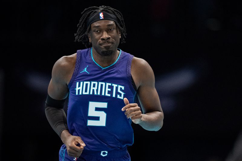 CHARLOTTE, NORTH CAROLINA - DECEMBER 03: Mark Williams #5 of the Charlotte Hornets looks on in the first quarter of the game against the Philadelphia 76ers during the Emirates NBA Cup at Spectrum Center on December 03, 2024 in Charlotte, North Carolina. NOTE TO USER: User expressly acknowledges and agrees that, by downloading and or using this photograph, User is consenting to the terms and conditions of the Getty Images License Agreement. (Photo by Jacob Kupferman/Getty Images)