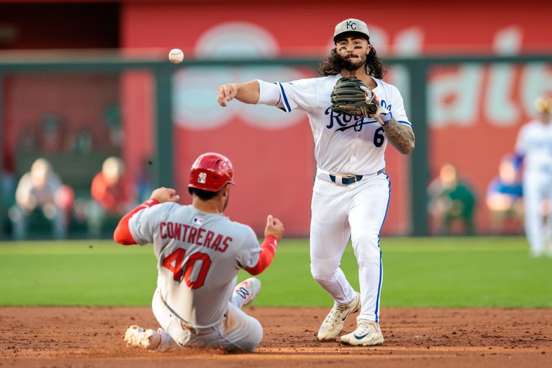 May 17, 2025; Kansas City, Missouri, USA; Kansas City Royals third base Jonathan India (6) throws to first base over St. Louis Cardinals first base Willson Contreras (40) during the second inning at Kauffman Stadium. Mandatory Credit: William Purnell-Imagn Images
