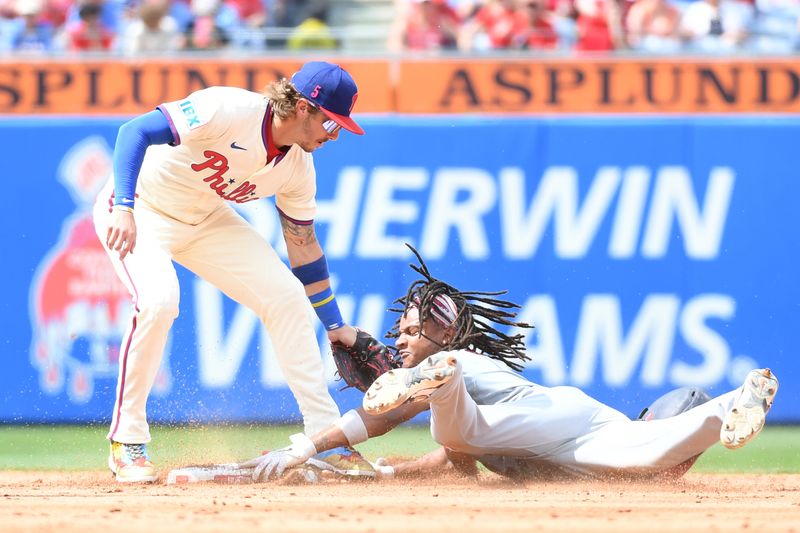 Aug 18, 2024; Philadelphia, Pennsylvania, USA; Washington Nationals shortstop CJ Abrams (5) steals second base ahead of tag by Philadelphia Phillies second base Bryson Stott (5) during the third inning at Citizens Bank Park. Mandatory Credit: Eric Hartline-USA TODAY Sports