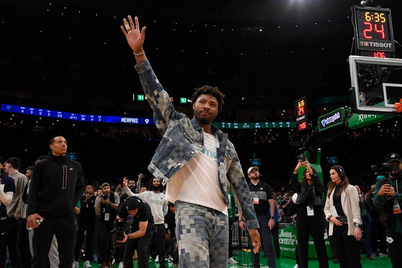 BOSTON, MA - FEBRUARY 4:  Marcus Smart looks on during the game between the Memphis Grizzlies  and Boston Celtics on February 4, 2024 at the TD Garden in Boston, Massachusetts. NOTE TO USER: User expressly acknowledges and agrees that, by downloading and or using this photograph, User is consenting to the terms and conditions of the Getty Images License Agreement. Mandatory Copyright Notice: Copyright 2024 NBAE  (Photo by Brian Babineau/NBAE via Getty Images)