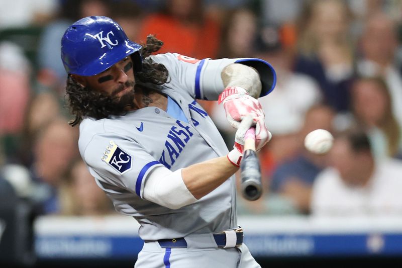 May 12, 2025; Houston, Texas, USA; Kansas City Royals third baseman Jonathan India (6) hits a single against the Houston Astros in the sixth inning at Daikin Park. Mandatory Credit: Thomas Shea-Imagn Images