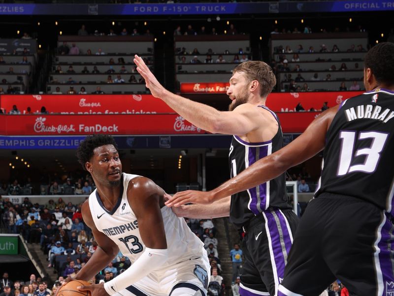 MEMPHIS, TN - DECEMBER 5: Jaren Jackson Jr. #13 of the Memphis Grizzlies handles the ball during the game against the Sacramento Kings on December 5, 2024 at FedExForum in Memphis, Tennessee. NOTE TO USER: User expressly acknowledges and agrees that, by downloading and or using this photograph, User is consenting to the terms and conditions of the Getty Images License Agreement. Mandatory Copyright Notice: Copyright 2024 NBAE (Photo by Joe Murphy/NBAE via Getty Images)