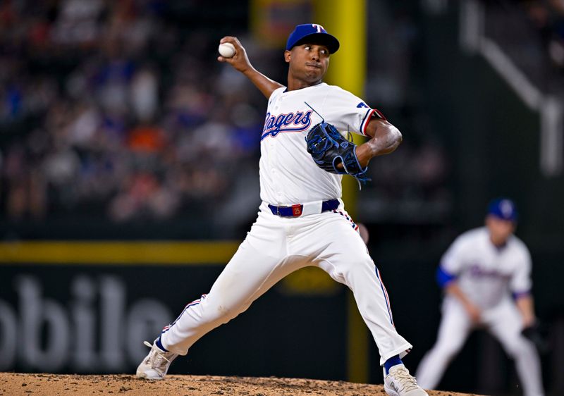 Aug 7, 2024; Arlington, Texas, USA;  Texas Rangers relief pitcher Jose Leclerc (25) pitches against the Houston Astros during the fifth inning at Globe Life Field. Mandatory Credit: Jerome Miron-USA TODAY Sports