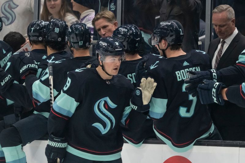 Oct 19, 2022; Seattle, Washington, USA; Seattle Kraken forward Ryan Donato (9) celebrates after scoring a goal during the second period against the St. Louis Blues at Climate Pledge Arena. Mandatory Credit: Stephen Brashear-USA TODAY Sports