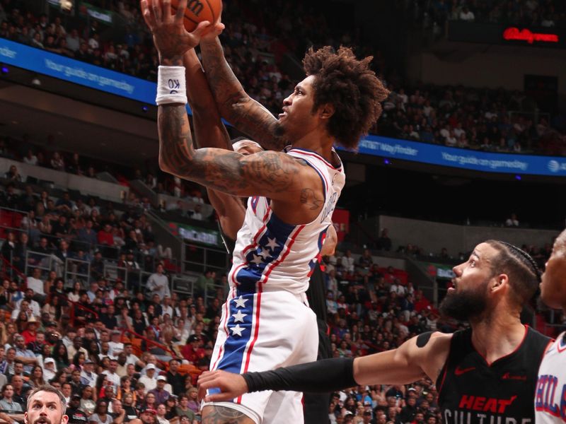 MIAMI, FL - APRIL 4: Kelly Oubre Jr. #9 of the Philadelphia 76ers drives to the basket during the game against the Miami Heat on April 4, 2024 at Kaseya Center in Miami, Florida. NOTE TO USER: User expressly acknowledges and agrees that, by downloading and or using this Photograph, user is consenting to the terms and conditions of the Getty Images License Agreement. Mandatory Copyright Notice: Copyright 2024 NBAE (Photo by Issac Baldizon/NBAE via Getty Images)