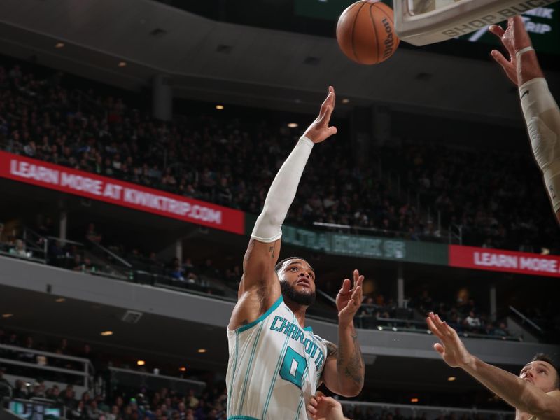 MILWAUKEE, WI - FEBRUARY 9: Miles Bridges #0 of the Charlotte Hornets drives to the basket during the game against the Milwaukee Bucks on February 9, 2024 at the Fiserv Forum Center in Milwaukee, Wisconsin. NOTE TO USER: User expressly acknowledges and agrees that, by downloading and or using this Photograph, user is consenting to the terms and conditions of the Getty Images License Agreement. Mandatory Copyright Notice: Copyright 2024 NBAE (Photo by Gary Dineen/NBAE via Getty Images).