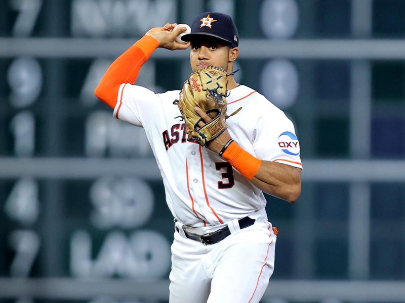 Sep 13, 2023; Houston, Texas, USA; Houston Astros shortstop Jeremy Pena (3) throws a fielded ball to first base for an out against the Oakland Athletics during the third inning at Minute Maid Park. Mandatory Credit: Erik Williams-USA TODAY Sports