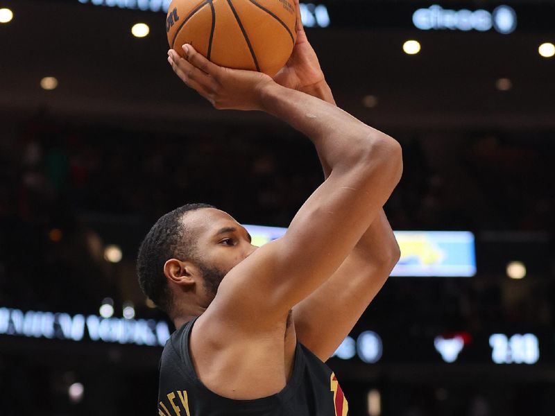 CHICAGO, ILLINOIS - FEBRUARY 28: Evan Mobley #4 of the Cleveland Cavaliers shoots a three pointer against the Cleveland Cavaliers during the first half at the United Center on February 28, 2024 in Chicago, Illinois. NOTE TO USER: User expressly acknowledges and agrees that, by downloading and or using this photograph, User is consenting to the terms and conditions of the Getty Images License Agreement. (Photo by Michael Reaves/Getty Images)