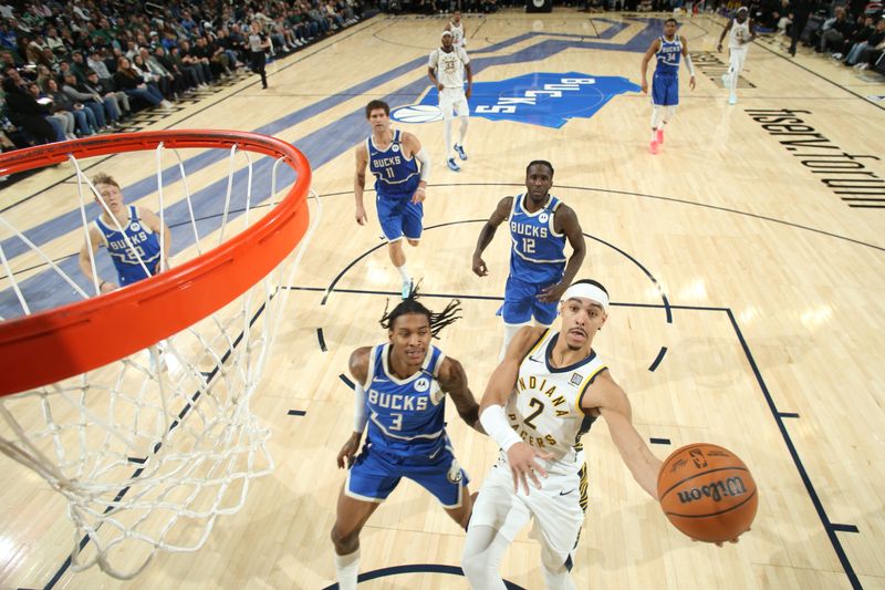 MILWAUKEE, WI - MARCH 15: Andrew Nembhard #2 of the Indiana Pacers drives to the basket during the game against the Milwaukee Bucks on March 15, 2025 at Fiserv Forum Center in Milwaukee, Wisconsin. NOTE TO USER: User expressly acknowledges and agrees that, by downloading and or using this Photograph, user is consenting to the terms and conditions of the Getty Images License Agreement. Mandatory Copyright Notice: Copyright 2025 NBAE (Photo by Gary Dineen/NBAE via Getty Images).