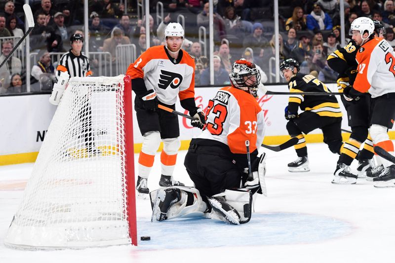 Jan 29, 2026; Boston, Massachusetts, USA; Boston Bruins left wing Viktor Arvidsson (71) scores a goal past Philadelphia Flyers goaltender Samuel Ersson (33) during the first period at TD Garden. Mandatory Credit: Bob DeChiara-Imagn Images