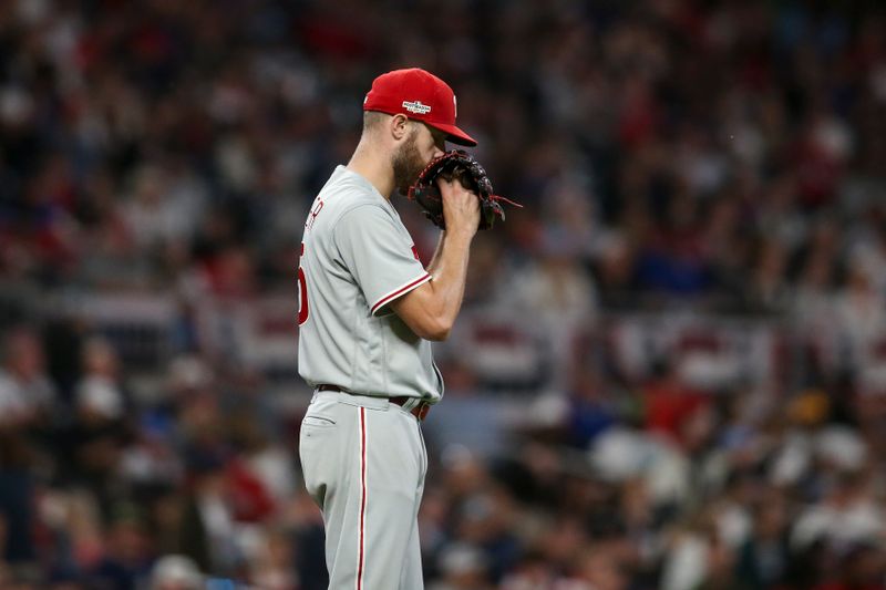 Oct 12, 2022; Atlanta, Georgia, USA; Philadelphia Phillies starting pitcher Zack Wheeler (45) prepares to throw against the Atlanta Braves in the fourth inning during game two of the NLDS for the 2022 MLB Playoffs at Truist Park. Mandatory Credit: Brett Davis-USA TODAY Sports