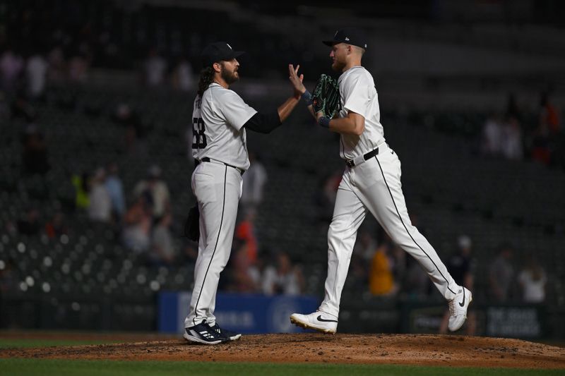 Aug 27, 2024; Detroit, Michigan, USA; Detroit Tigers pitcher Jason Foley (68) celebrates with  center fielder Parker Meadows (22) after their win over the Los Angeles Angels at Comerica Park. Mandatory Credit: Lon Horwedel-USA TODAY Sports