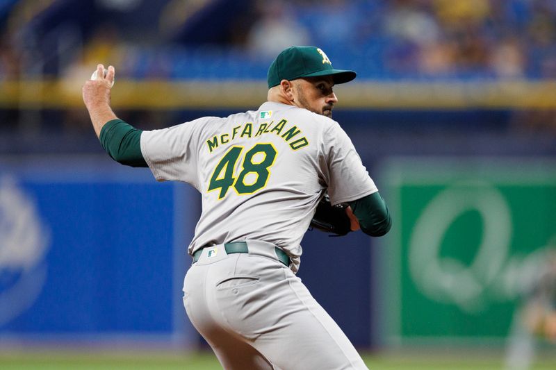 May 28, 2024; St. Petersburg, Florida, USA;  Oakland Athletics pitcher T.J. McFarland (48) throws a pitch against the Tampa Bay Rays in the sixth inning at Tropicana Field. Mandatory Credit: Nathan Ray Seebeck-USA TODAY Sports