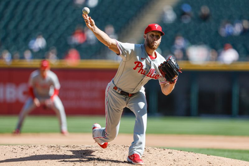 Apr 18, 2023; Chicago, Illinois, USA; Philadelphia Phillies starting pitcher Zack Wheeler (45) delivers against the Chicago White Sox during the first inning of game one of the doubleheader at Guaranteed Rate Field. Mandatory Credit: Kamil Krzaczynski-USA TODAY Sports