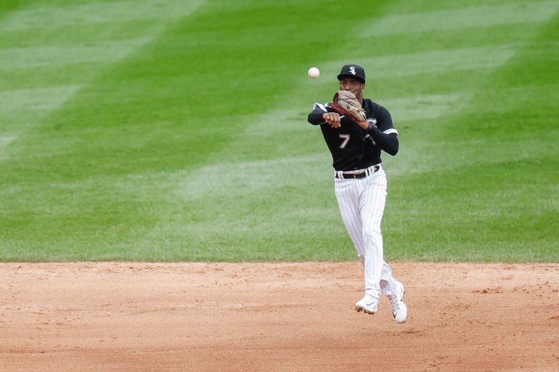 Sep 28, 2023; Chicago, Illinois, USA; Chicago White Sox shortstop Tim Anderson (7) throws to first base for an out against the Arizona Diamondbacks during the ninth inning at Guaranteed Rate Field. Mandatory Credit: Kamil Krzaczynski-USA TODAY Sports