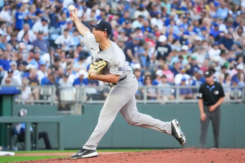 Jun 12, 2024; Kansas City, Missouri, USA;  New York Yankees starting pitcher Cody Poteet (72) delivers a pitch against the Kansas City Royals in the first inning at Kauffman Stadium. Mandatory Credit: Denny Medley-USA TODAY Sports