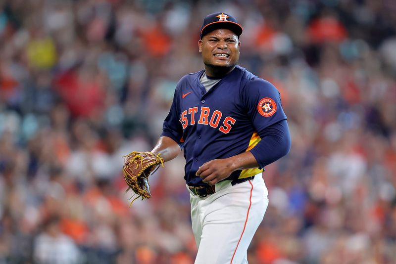 Jun 1, 2024; Houston, Texas, USA; Houston Astros starting pitcher Framber Valdez (59) reacts after a strikeout against the Minnesota Twins during the fifth inning at Minute Maid Park. Mandatory Credit: Erik Williams-USA TODAY Sports