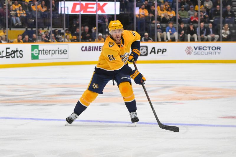 Oct 28, 2025; Nashville, Tennessee, USA; Nashville Predators center Jonathan Marchessault (81) passes the puck against the Tampa Bay Lightning during the third period at Bridgestone Arena. Mandatory Credit: Steve Roberts-Imagn Images Oct 28, 2025; Nashville, Tennessee, USA; Nashville Predators center Jonathan Marchessault (81) passes the puck against the Tampa Bay Lightning during the third period at Bridgestone Arena. Mandatory Credit: Steve Roberts-Imagn Images