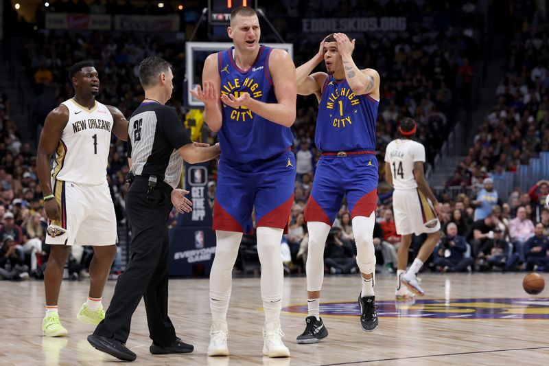 DENVER, COLORADO - JANUARY 12: Nikola Jokic #15 of the Denver Nuggets reacts to being called for a foul against the New Orleans Pelicans in the third quarter at Ball Arena on January 12, 2024 in Denver, Colorado. NOTE TO USER: User expressly acknowledges and agrees that, by downloading and or using this photograph, User is consenting to the terms and conditions of the Getty Images License Agreement.  (Photo by Matthew Stockman/Getty Images)